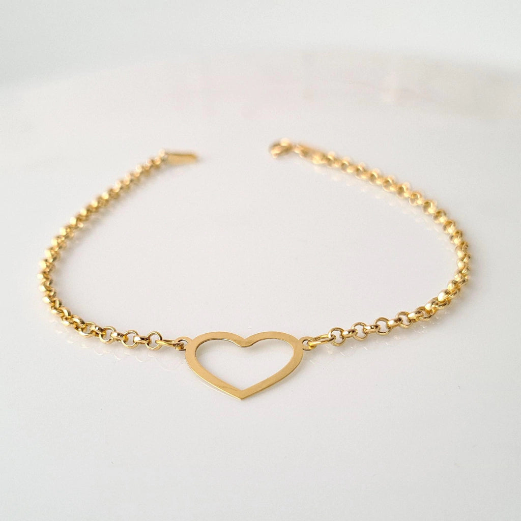 Pulseira com coração vazado em ouro 18k